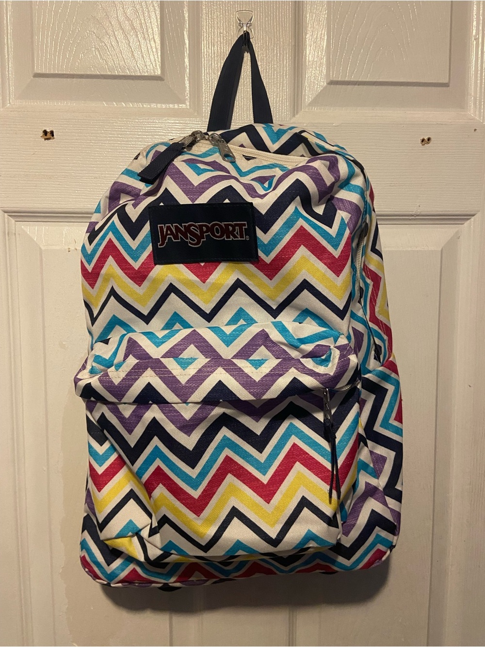 JanSport Multicolor Chevron Backpack - Vibrant Zigzag Design